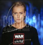 04-11-2002 Liesbeth Kamerling at studio in Amsterdam, by order of Televizier Magazine. November 05, 2002.

[keywords]Posed, Headshot, Barbed Wire[/keywords]